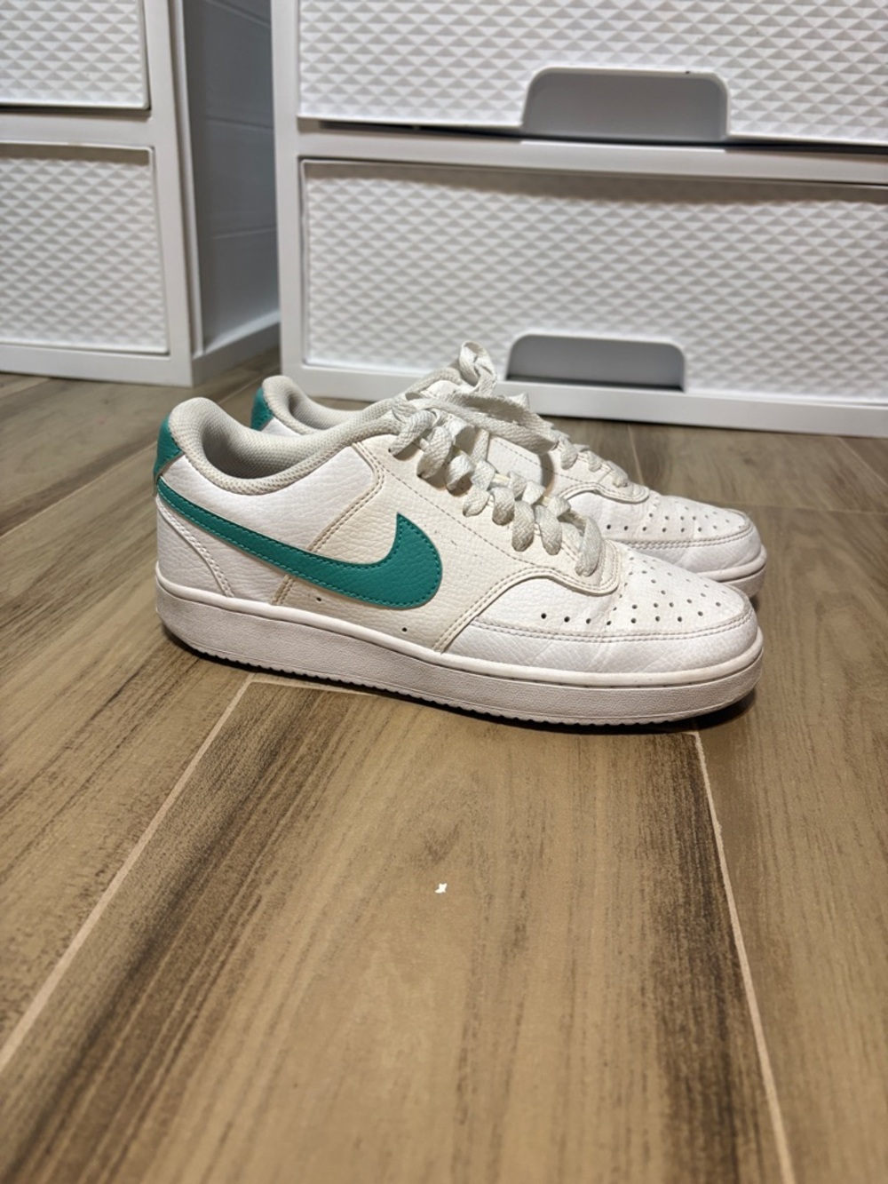 Nike White Low-Top Sneakers with Teal Swoosh